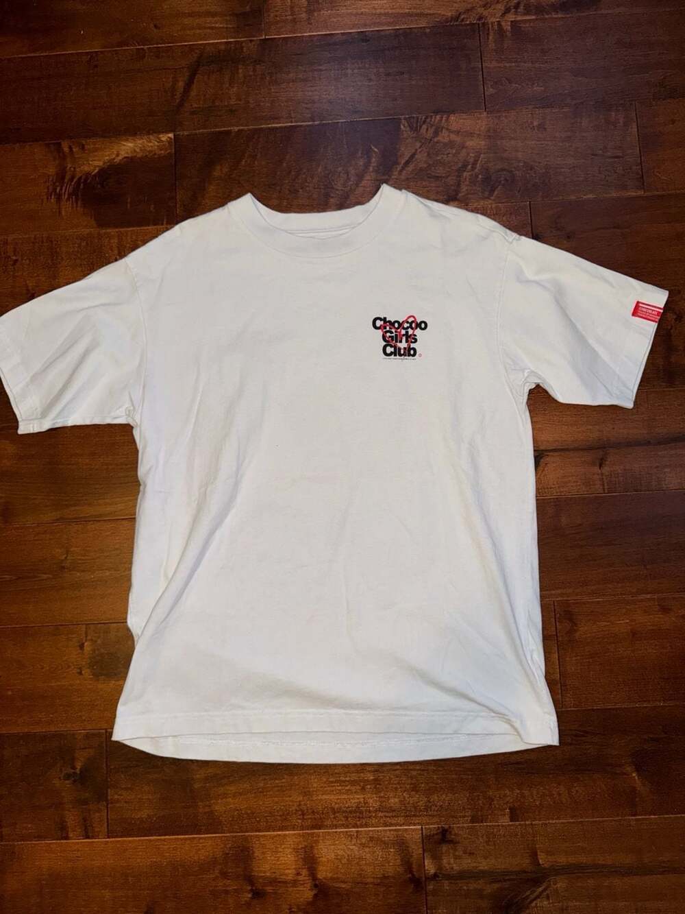:CHOCOOLATE White Graphic T-Shirt with Chocoo Girls Club Logo